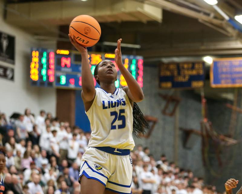 Lyon's Nora Ezike (25) puts up a shot during their Class 4A Lyons Sectional semifinal basketball game between Lyons vs Young. Feb 25, 2025 in La Grange.