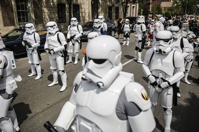 Stormtroopers line up during the parade for the Joliet Public Library's fifth annual Star Wars Day on Saturday, June 7, 2014.