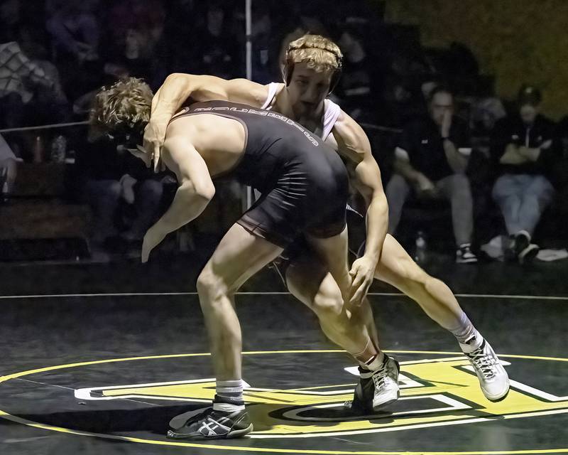 Fulton's Ben Fosdick (back) tries to control Rockridge's Reese Finch during the 145-pound title bout at the 1A Riverdale Regional on Saturday, Feb. 4, 2023.