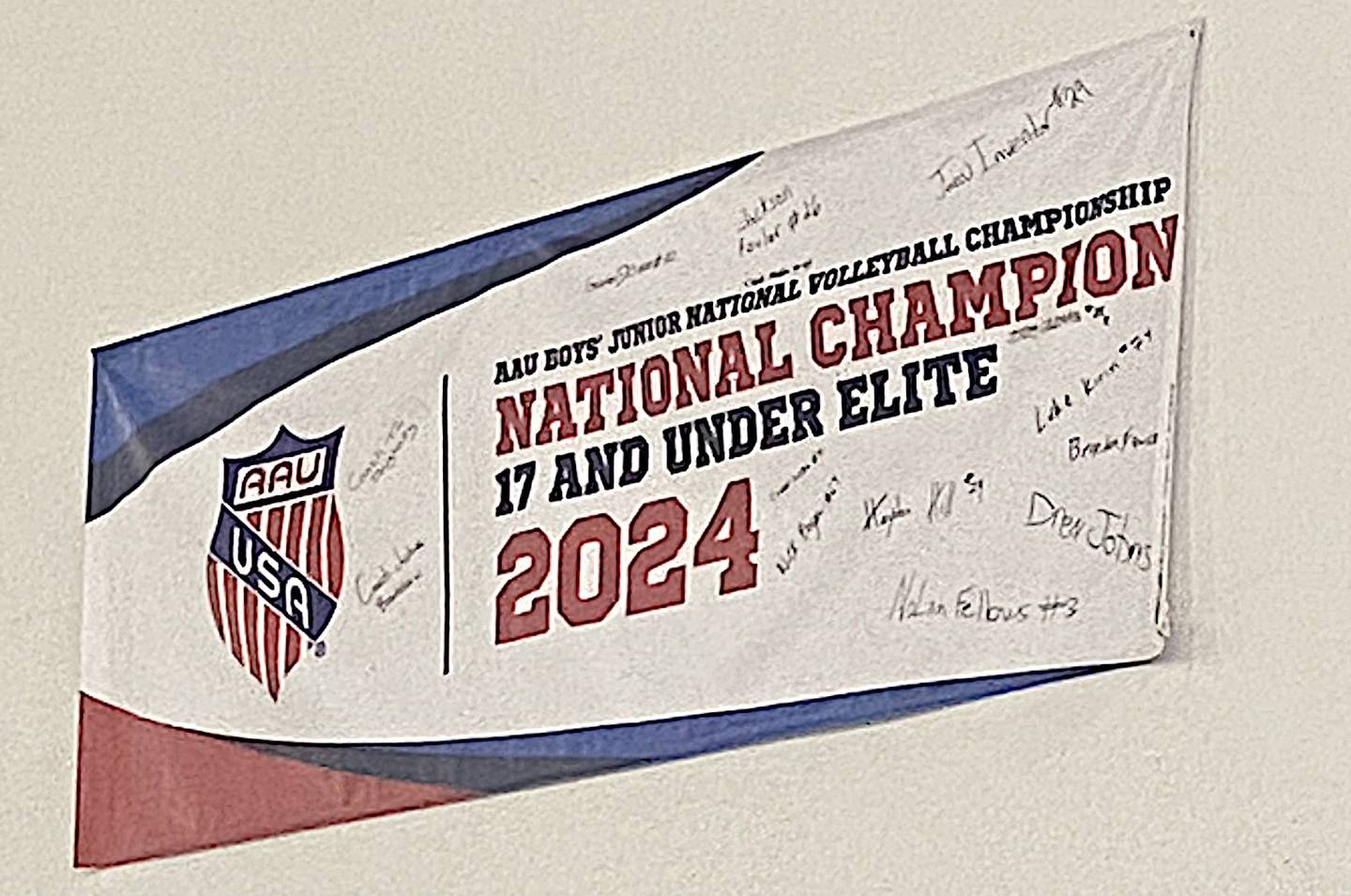 The UNO 17U Elite national championship banner hangs in the UNO facility.