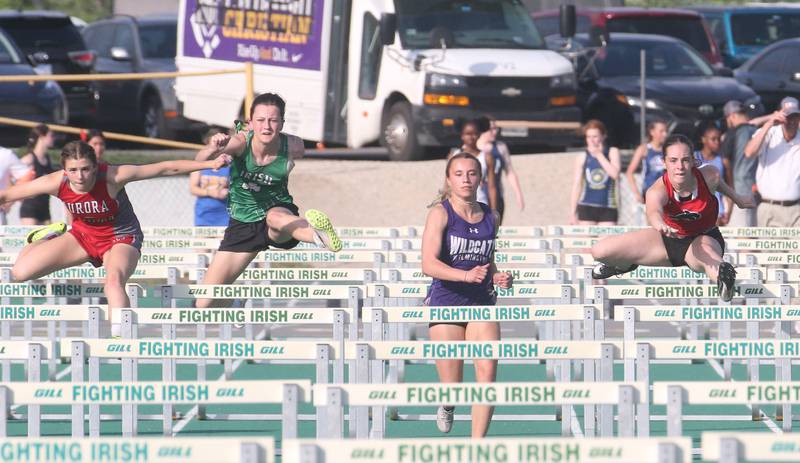 (From left) Aurora Christian's Kia Jewell, Seneca's Lilly Pfeifer, Wilmington's McKenna Van Tilburg and Indian Creek's Ally Keilman compete in the 100 meter hurdles during the Class 1A Sectional track meet on Thursday, May 15, 2025 at Seneca High School.