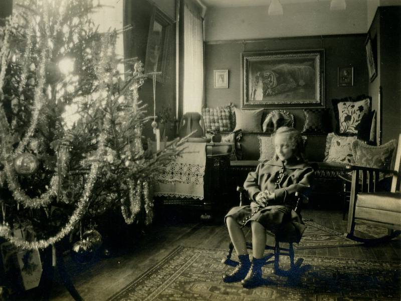 Evelyn Allen sits in her family’s apartment on Williams Street in Crystal Lake, circa 1910. The apartment was on the second floor over Morris Cohn’s store. The building is now owned by Crystal Lake Bank & Trust.