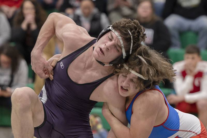 Dixon’s Owen Brooks and Oregon’s Quentin Berry wrestle at 182 pounds Thursday, Jan. 19, 2023 in Rock Falls.