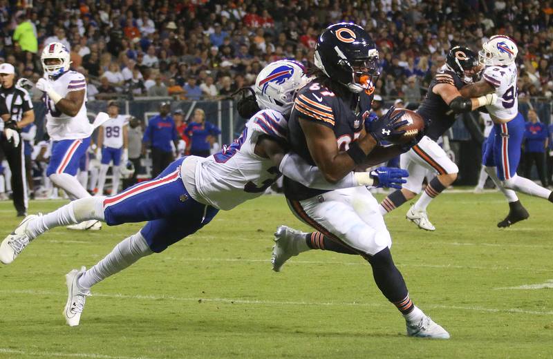 Chicago Bears wide receiver Luther Burden III, makes a catch over Buffalo Bills safety Tre Herndon on Sunday, Aug. 17, 2025 at Soldier Field in Chicago.