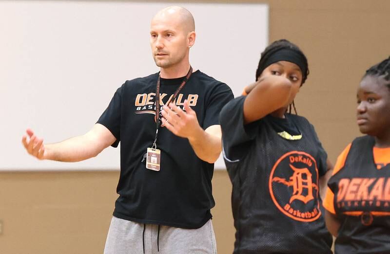 New DeKalb girls basketball head coach Bradley Bjelk gives instruction Thursday, June 23, 2022, at girls basketball practice at DeKalb High School.