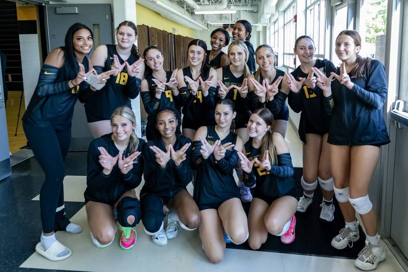 Joliet West’s varsity volleyball team poses for a photo before their home game against Joliet Catholic on Sept. 4, 2025.