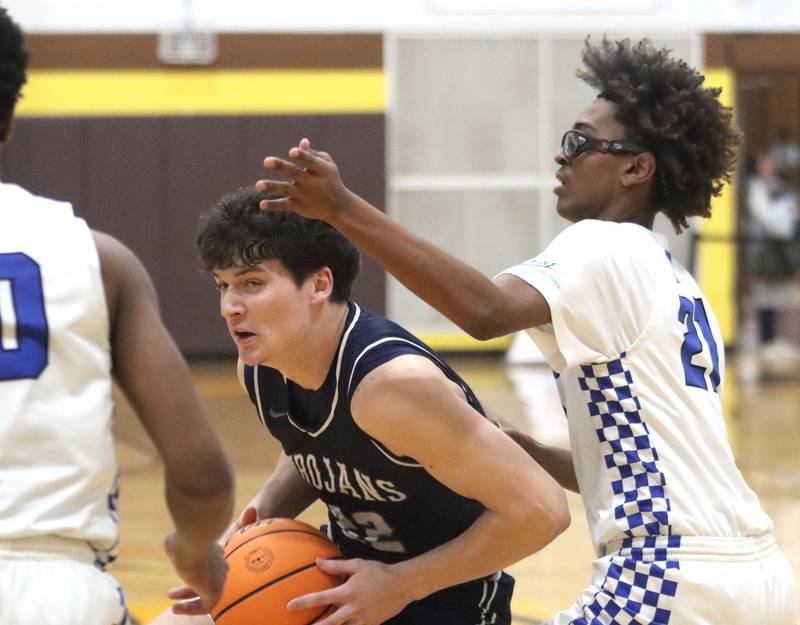 Cary-Grove’s Adam Bauer works under the hoop against Larkin’s Mac Irvin, right, in varsity boys basketball Hinkle Holiday Classic action on Friday, Dec. 26, 2025, at Jacobs High School in Algonquin.