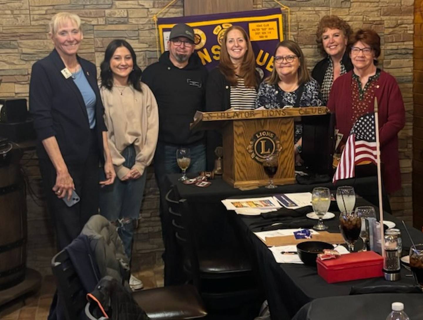 Streator Lions Club governor elect Jama Wahl (from left), lions Hannah Kaparti, Matt Vincent, Gwen Vincent, Sandra Shartzer, Merianne Morris and Kay Fulkerson
