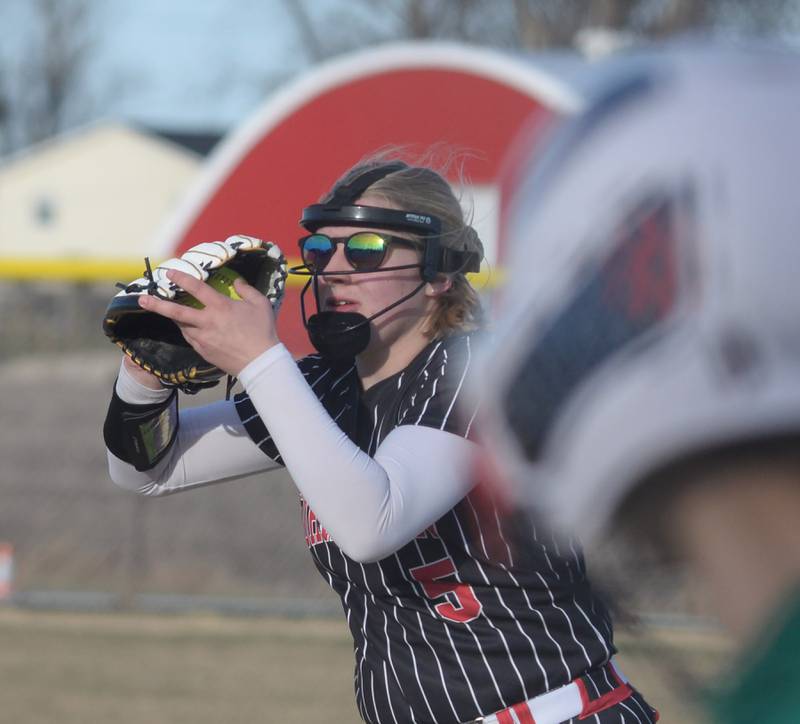 Forreston first baseman Alivia Ingram squeezes the ball for an out against River Ridge/Scales Mound on Monday, March 24, 2025 in Forreston.