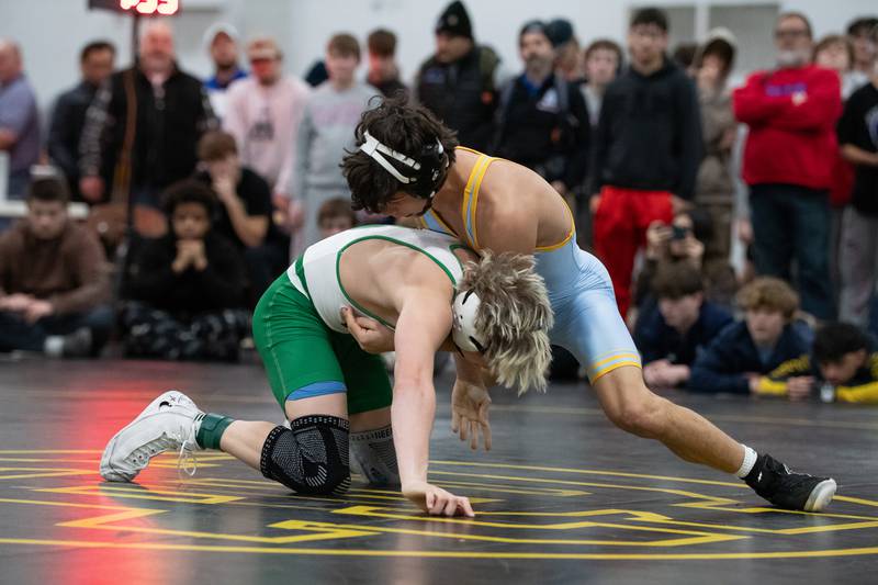 Ottawa's Wesley Janick, top, and Seneca's Raiden Terry wrestle in the 120-pound championship match during the Reed-Custer Comet Classic Wrestling Invite on Saturday, Jan 17.