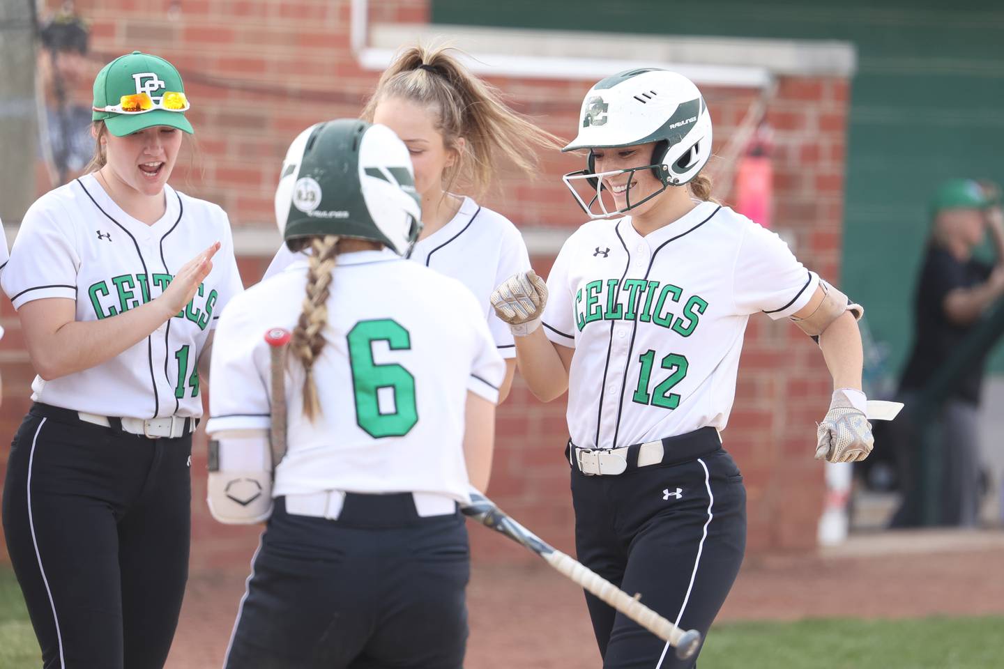 Providence’s Gianna Russo crosses the plate after a 3 run shot against Joliet Catholic. Monday, May 16, 2022, in New Lenox.