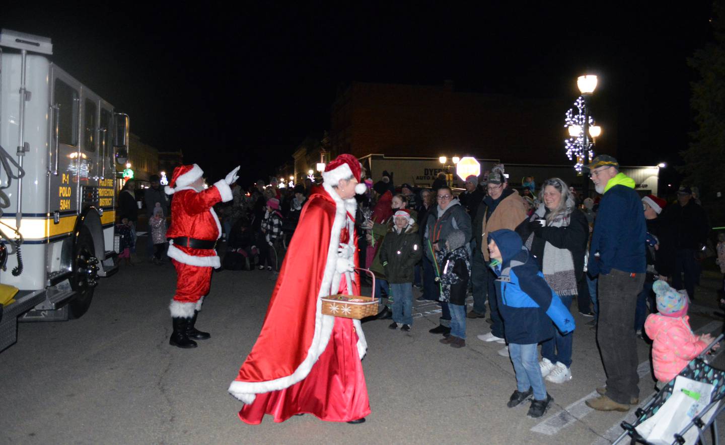 Santa and Mrs. Claus greet community members after arriving in downtown Polo for the third annual Polo Christmas Festival on Dec. 4.