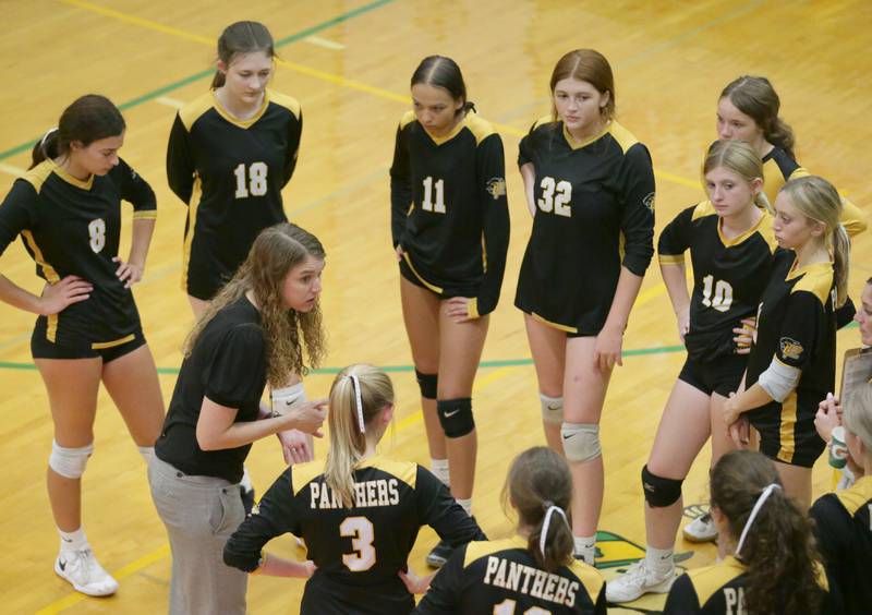 Putnam County head volleyball coach Amy Bell talks to her team during a timeout in the Tri-County Conference Tournament on Monday, Oct. 10, 2022 in Seneca.