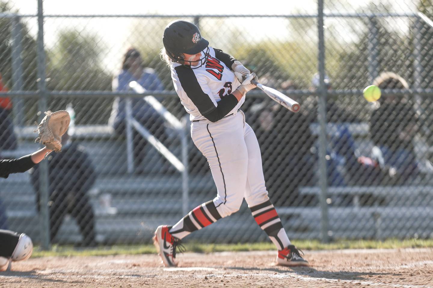 Lincoln-Way Central batter McKenzie Murdock hits a single on Wednesday, May 12, 2021, at Lincoln-Way Central High School in New Lenox, Ill.