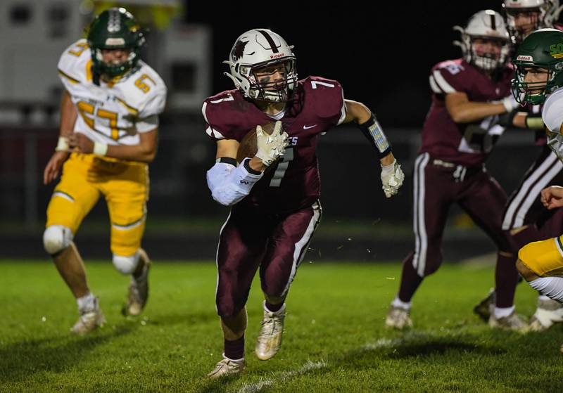 Prairie Ridge's Tyler Vasey advances a kickoff return early in the first half against rival Crystal Lake South during Friday night's football game at Prairie Ridge High School on October 15, 2021 in Crystal Lake, IL.