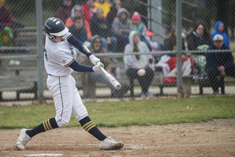 Sterling's Braden Hartman drives the ball to left for a single Tuesday, April 5, 2022 against Alleman.