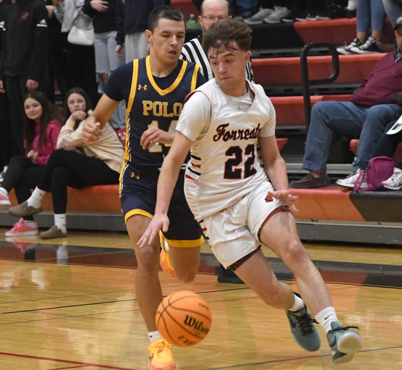 Forreston's Drayvin Peters dribbles against Polo on Saturday, Dec. 13, 2025 at the 64th Annual Forreston Holiday Basketball Tournament held at Forreston High School.
