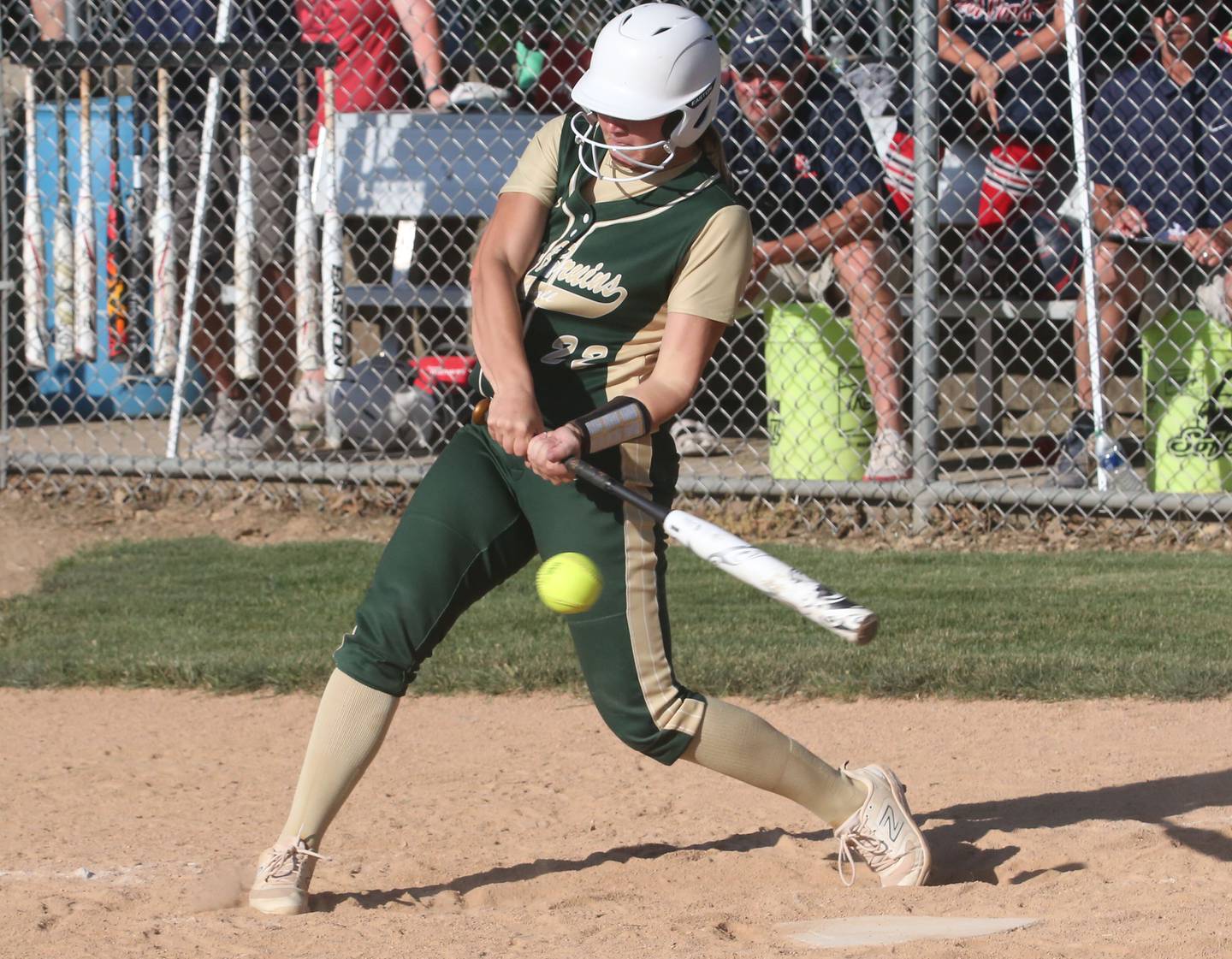 St. Bede's Ella Hermes smacks a three-run home run in the Class 3A Sectional championship game on Friday, May 26, 2023 at St. Bede Academy.
