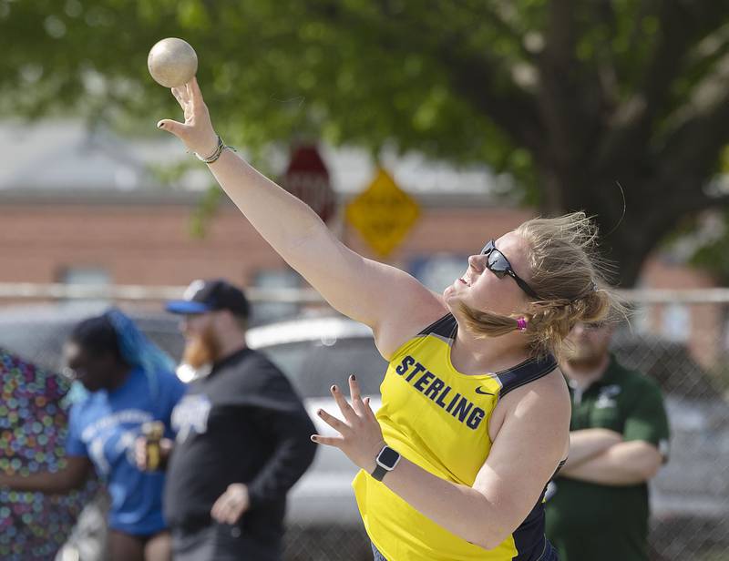 Sterling’s Eleanor Aitken fires off the shot put Thursday, May 11, 2023 at the class 2A Sterling girls track sectionals.