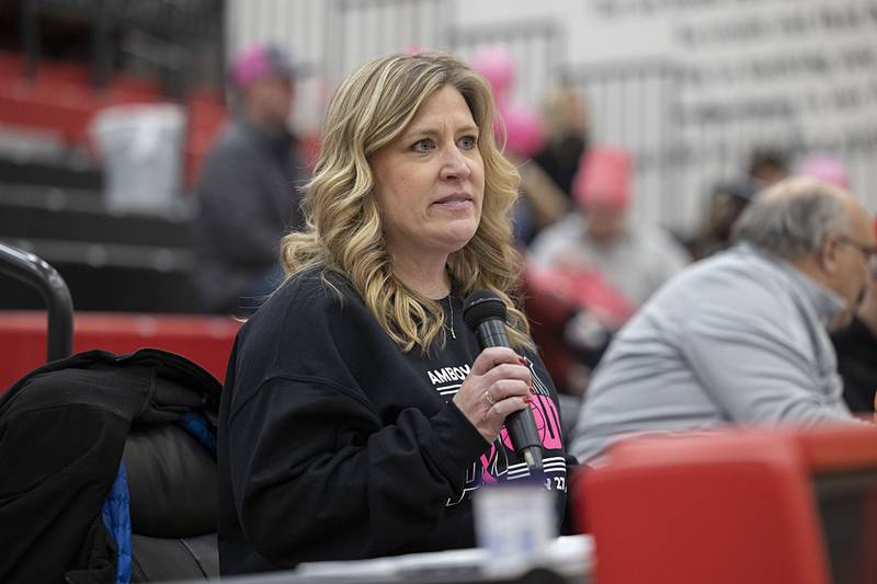 Amanda Blaine, Executive Director of the CGH Health Foundation, addresses a crowd Tuesday, Jan. 27, 2026, at Amboy High School. The school held a Pink Out fundraiser to help fund the foundation that provides no cost mammograms.