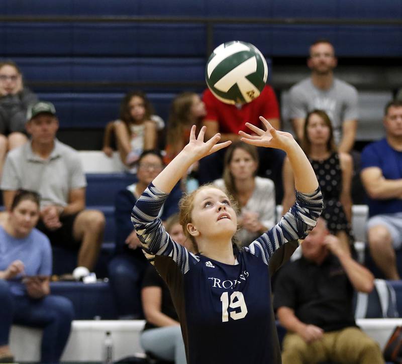 Cary-Grove’s Olivia Kessler sets the ball during a Fox Valley Conference volleyball match Thursday, Aug. 25, 2022, between Cary-Grove and Crystal Lake South at Cary-Grove High School.