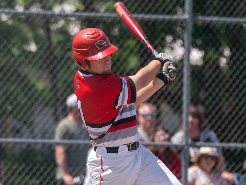 Yorkville's Connor Corrigan (11) slaps a single against Plainfield North during the Class 4A Yorkville Regional baseball final at Yorkville High School on Saturday, May 28, 2022.