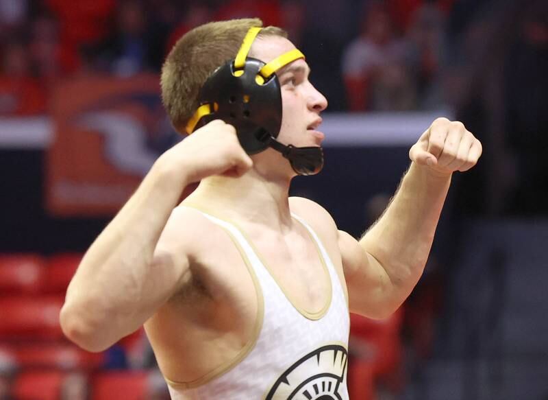 Sycamore’s Gus Cambier celebrates his win over Joliet Catholic’s Connor Cumbee Saturday, Feb. 18, 2023, in the Class 2A 152 pound 3rd place match in the IHSA individual state wrestling finals in the State Farm Center at the University of Illinois in Champaign.