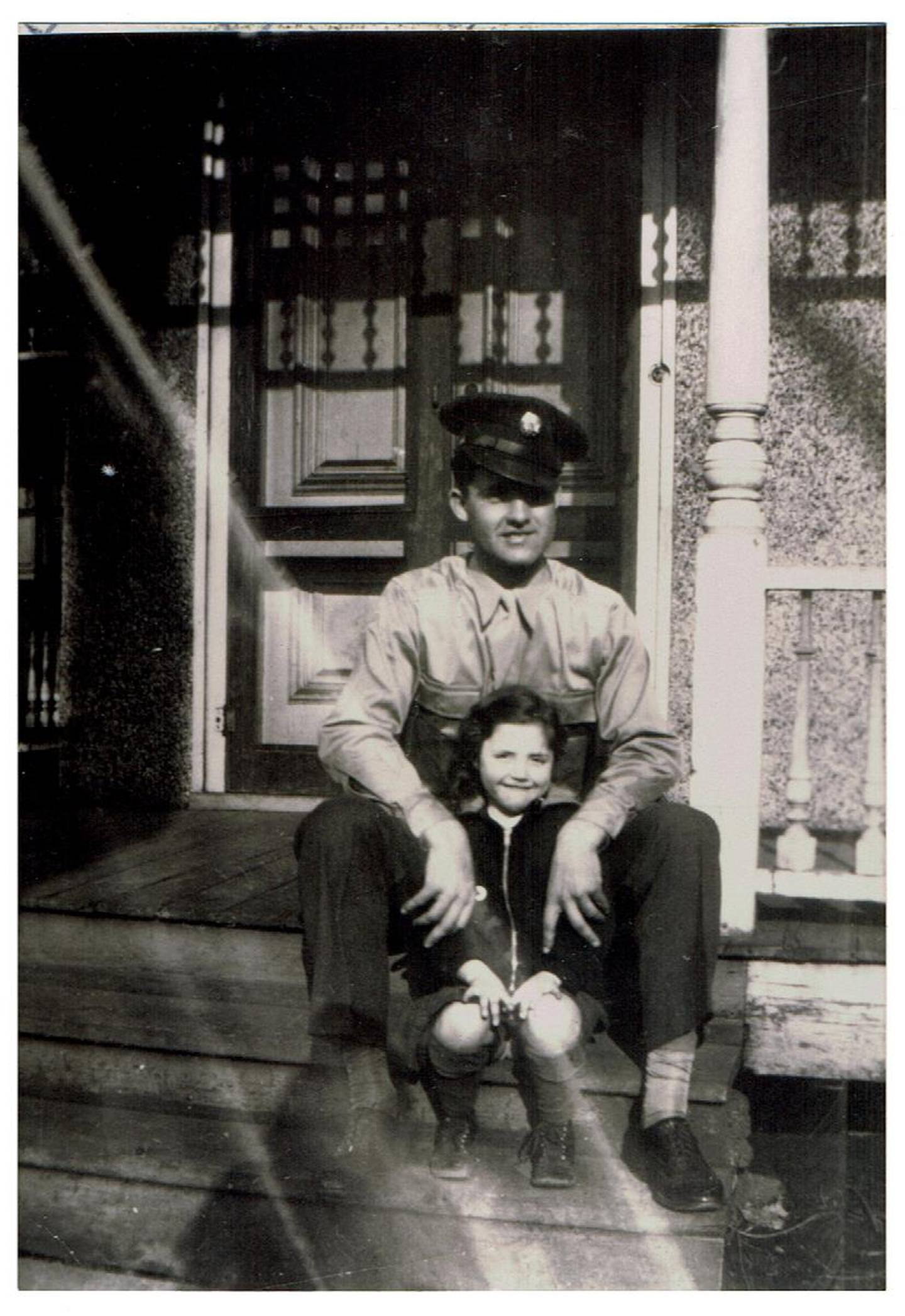 Mother of Janet Lagerloef (front) with one of her brothers after World War II Victory Parade in Batavia circa 1945.
