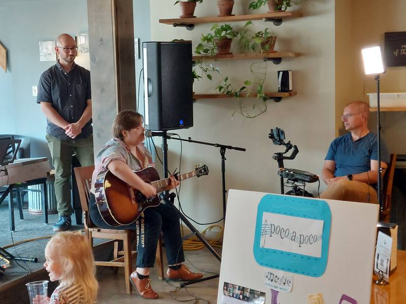 Bailey Banks, of Ottawa, performs "Both Sides Now" by Joni Mitchell on vocals and guitar Wednesday, June 14, 2023, during Poco a Poco's Coffeehouse Concert at More on Main in Streator.