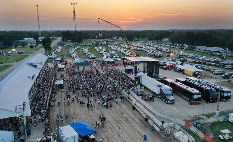 The sun sets over the concert featuring Sara Evans and Josh Turner on Thursday, Aug. 24, 2023 at the Bureau County Fair in Princeton.