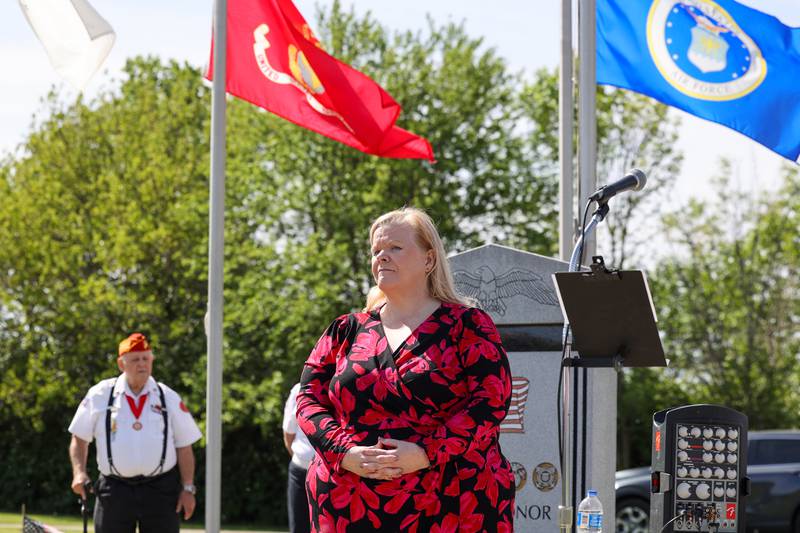 Karen Smietanski, assistant superintendent at the Veterans Assistance Commission of Kankakee County, participates in a ceremony dedicated to the late John Kirnbauer, a veteran whose ashes went unclaimed for five years, on Monday, May 26, 2025, at Kankakee Memorial Gardens.