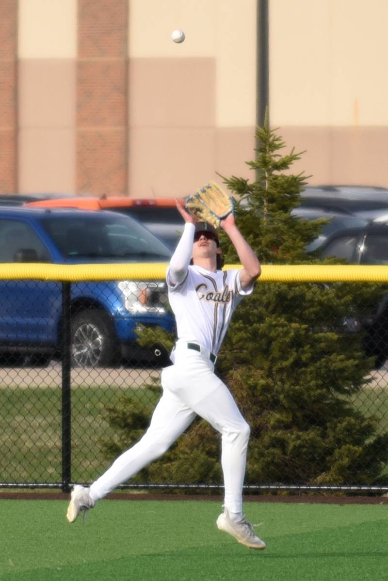 Coal City's Gavin Berger catches a fly ball during a home game against Bishop McNamara Thursday, April 3, 2025.
