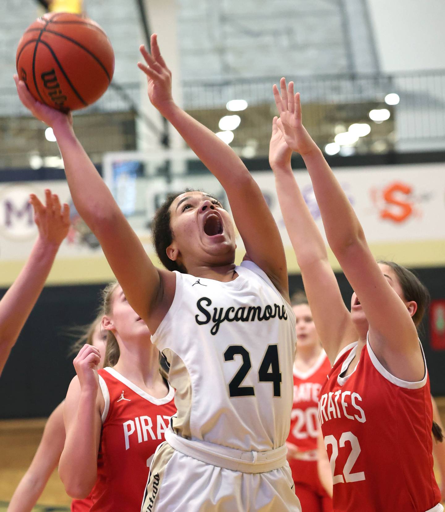 Sycamore's Monroe McGhee shoots over Ottawa's Marlie Orlandi Wednesday, Jan. 4, 2023, during their game at Sycamore High School.