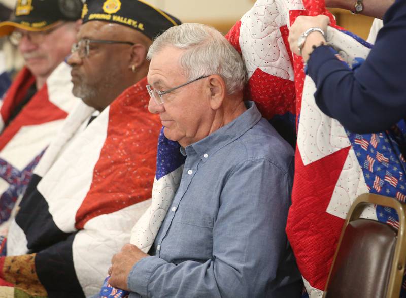 Veteran William Politsch, receives his quilt during the Quilt of Valor ceremony on Saturday, April 19, 2025 at the Moose Lodge in Princeton.