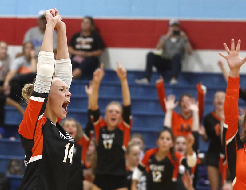 McHenry's Madyson Weber reacts to winning the McHenry winning the third game and match during a nonconference volleyball match against Marian Central  Monday, Aug. 28, 2023, at Marian Central Catholic High School.