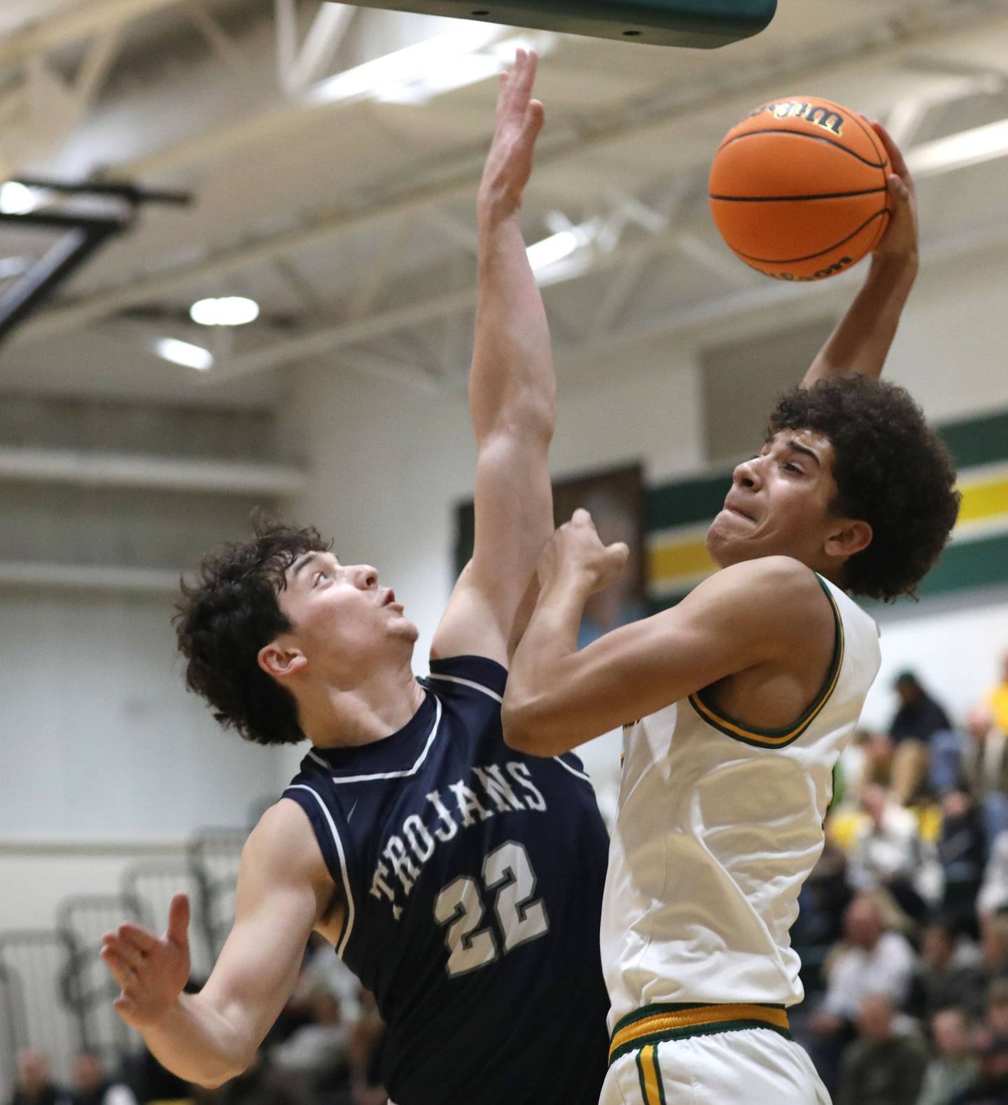 Cary-Grove's Adam Bauer blocks the shot of Crystal Lake South's Noah Cook during a Fox Valley Conference boys basketball game on Friday, Jan. 23, 2026, at Crystal Lake South High School.