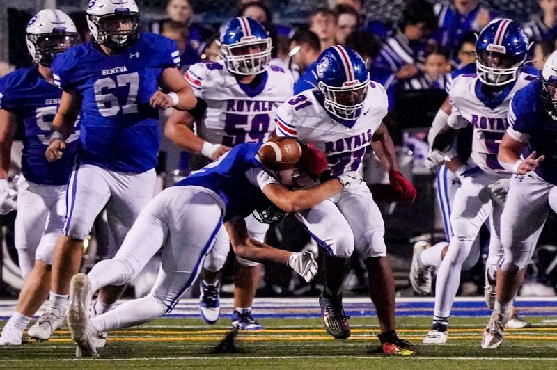 Geneva’s Dane Turner (2) strips the ball for a fumble against Larkin’s Devin Krueger (31) during a football game at Geneva High School on Friday, Aug 30, 2024.