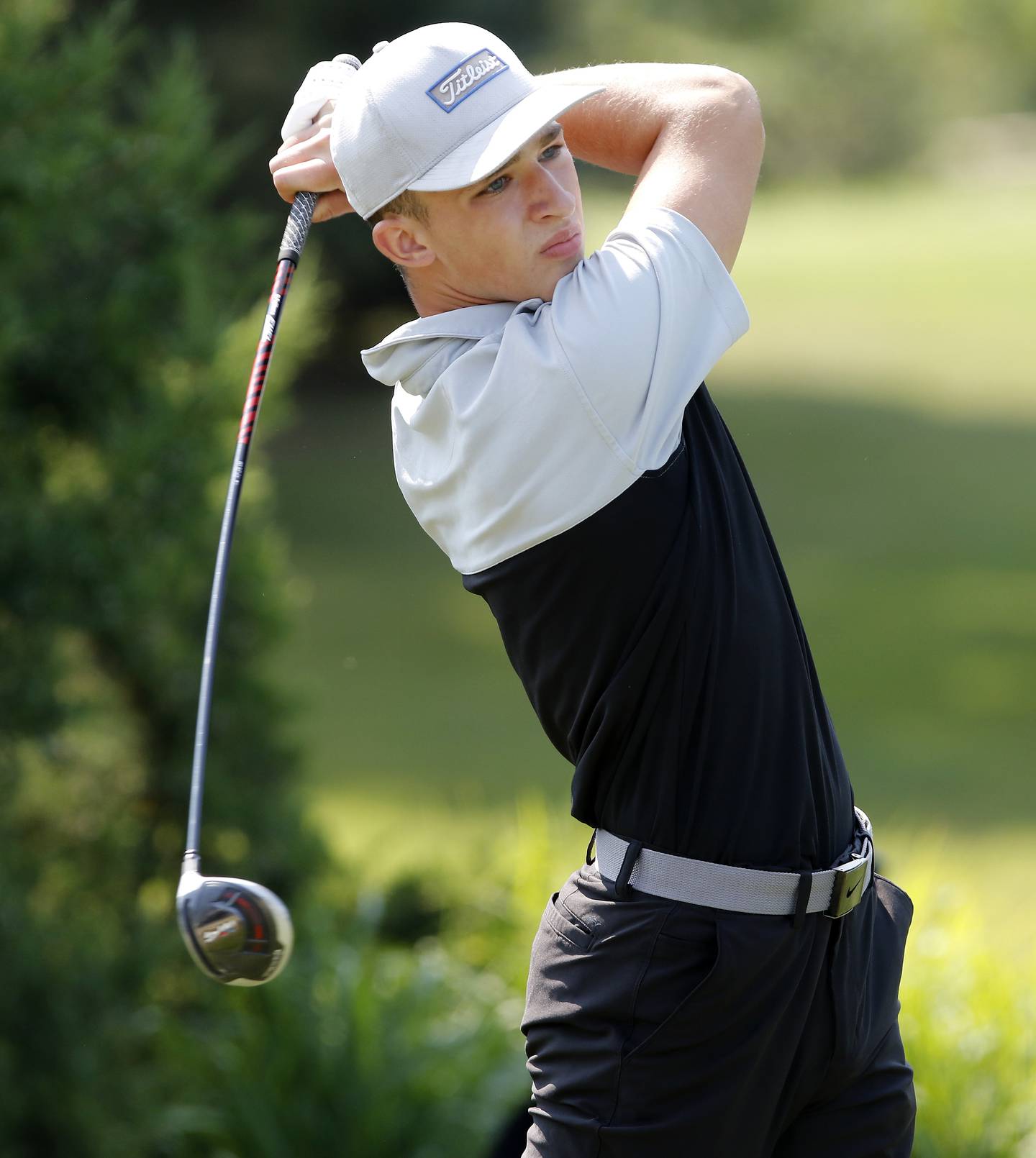 Huntley's Brendan Busky tees off on the first hole during the McHenry County Junior Golf Association's Tournament of Champions on Thursday, Aug. 5, 2021 at Woodstock Country Club in Bull Valley.