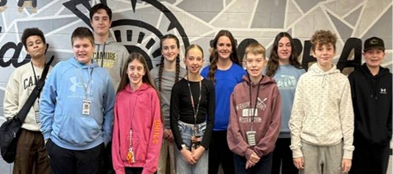Sycamore Middle School Students of the Month for December. The sixth grade students are Claudia Berek, Edison Hooper, Alicia Ocelotl, and Grace Park. The seventh grade students are Sophia Chami, Collin Hager, Ethan Kelm, and Lily Nachman. The eighth grade students are Jayden Keifer, Ellie Lieving, Kaleb Martin, and Henry Richards.