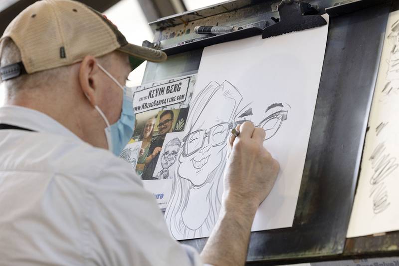 Caricature artist Kevin Berg of Genoa sketches out a work Tuesday, Jan. 17, 2023 at Sauk Valley College.