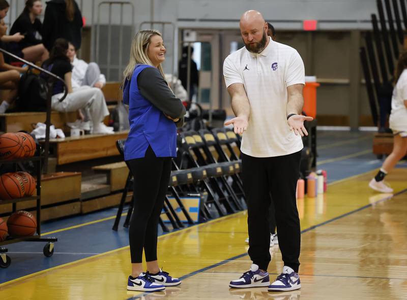 Lyons head coach Meghan Hutchens (L) shares a moment with Downers Grove North head coach Stephan Bolt (R) before the girls varsity basketball game between Downers Grove North and Lyons Township on Saturday, Jan. 11, 2025 in La Grange.