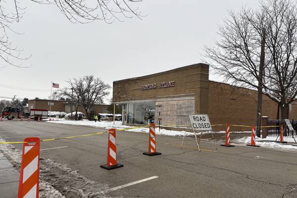 Roof of downtown Woodstock business collapses, road shut down amid concerns of further damage