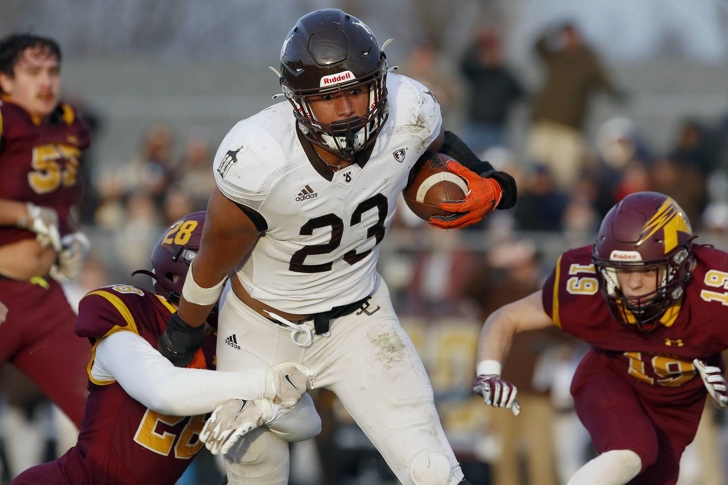 Joliet Catholic's Jordan Anderson powers through a tackle attempt by Richmond-Burton's Lukas Rendtorff during their IHSA Class 4A semifinal football game on Saturday, Nov. 20, 2021 at Richmond-Burton High School in Richmond. Joliet Catholic won 35-18, delivering Richmond-Burton their first loss in three years.