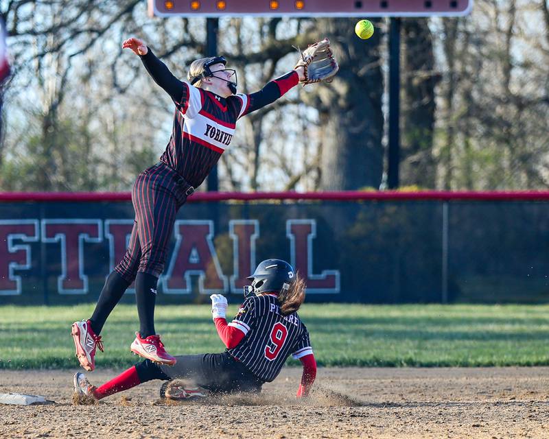 Benet's Nina Pesare (9) slides in safely to second base  during softball game between Benet at Yorkville.  April 5th, 2024.