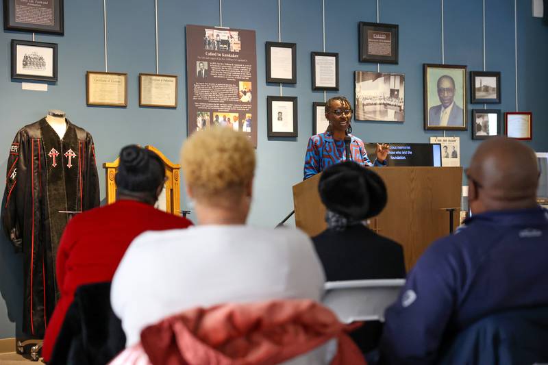 Monica Fountain, daughter of the late Kankakee civil rights leader Rev. William Copeland, gives a speech surrounded by items from his life during the opening of the exhibit 'Called to Kankakee: The Life and Legacy of the Rev. William H. Copeland Jr.' at the Kankakee County Museum on Saturday, Feb. 7, 2026.