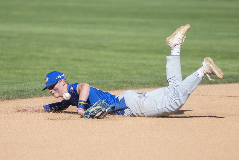 Maroa-Forsyth’s Ethan Willoughby dives but can’t come up with the ball against Richmond-Burton Friday, June 3, 2022 during the IHSA Class 2A baseball state semifinal.