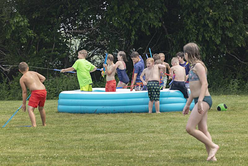 Inflatable pools and water guns were spread out across the grounds of the Meadows Thursday, June 15, 2023 for the last day of the younger kids’ SPARK camp.