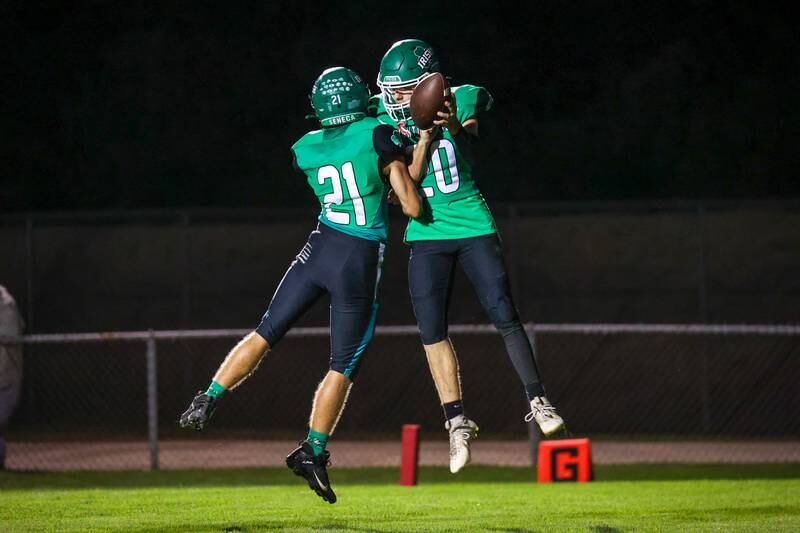 Thomas Milton and Griffin Hougas of Seneca celebrate Hougas’ touchdown on Friday, September 27, 2024 at Seneca high school in Seneca.