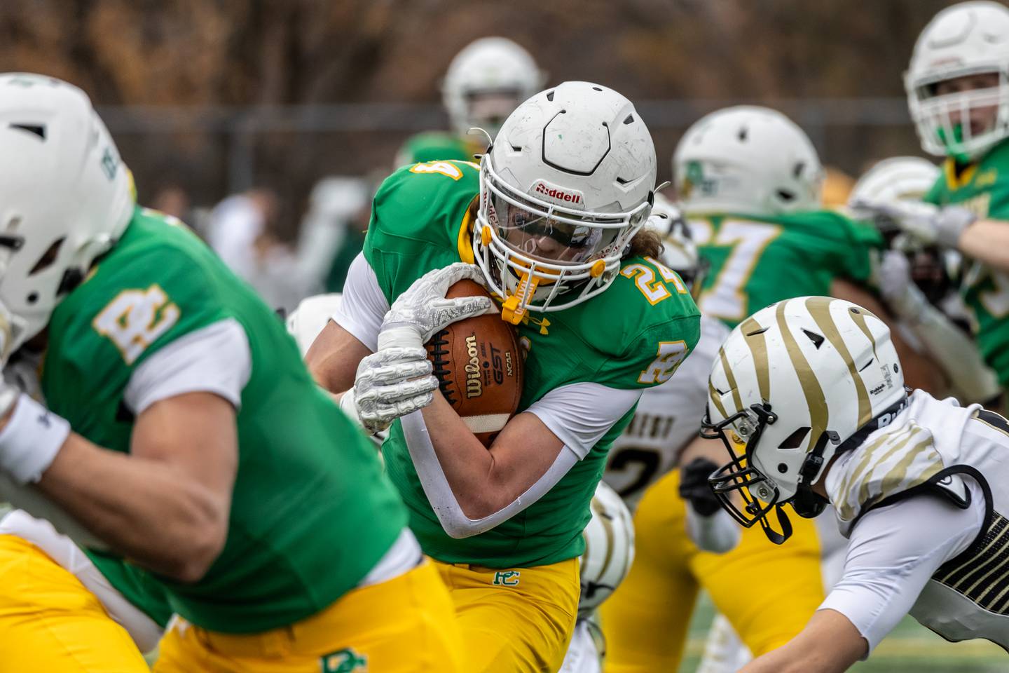 Providence's Broden Mackert dodges the defense during a 5A varsity football semifinal game against Oak Forest at Providence Catholic High School on Nov. 22, 2025.