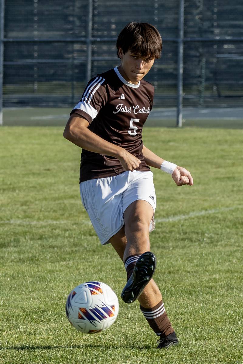 Joliet Catholic's Charlie Czerkies takes control of the ball during a varsity soccer home game against Joliet Central on Sept. 8, 2025.
